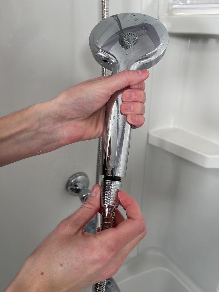 How Does A Shower Head With Hose Attach?