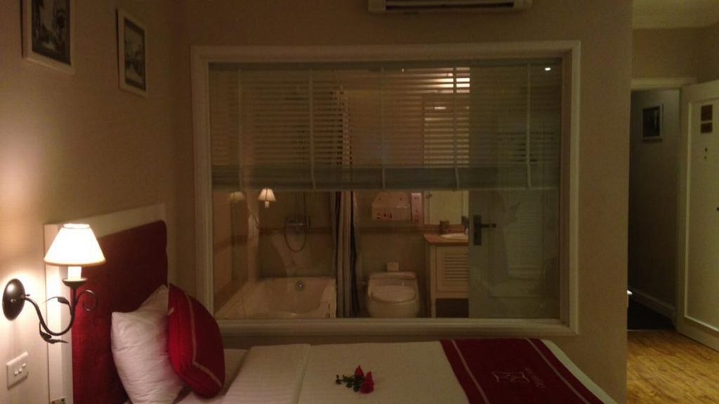 Why Do Hotels Have Windows Into The Shower?